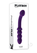 Playboy The Seeker Silicone Dual Vibrator Purple packaging with a smooth, curved design for enhanced pleasure.