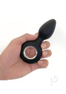 Vers Plug Vibrating Rechargeable Silicone Anal Plug Black held in hand showcasing its design and texture.
