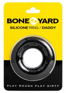 Boneyard The Daddy Silicone Cock Ring Black displayed on packaging for enhanced performance and comfort.