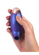 Hand holding the Love to Love Believer Clitoral Stimulator Night Blue, showcasing its elegant design and button.