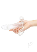 Size Up Clear View 2 Inch Vibrating Penis Extender held in hand, showcasing its transparent design and curved tip.
