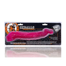 Oxballs Muscle Ripped Cocksheath Hot Pink packaged with a glossy surface, showcasing its flexibility and design.