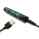 Prints Charming Buzzed 3.5 Inch Bullet Canna Queen Black charging with USB cable on white background.