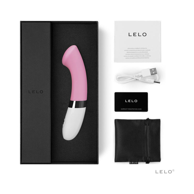 LELO GIGI 2 Rechargeable G Spot Vibrator Pink in sleek packaging with accessories including USB charger and storage pouch.