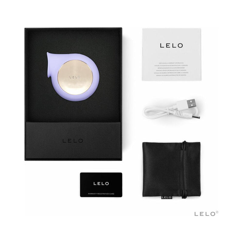 LELO SILA Rechargeable Sonic Clitoral Stimulator Lilac packaging contents including charger, instructions, and storage pouch.