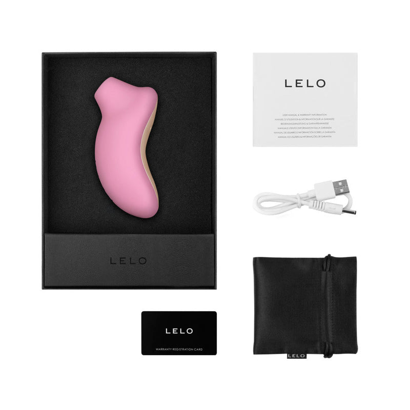 LELO SONA Rechargeable Clitoral Stimulator Pink in elegant packaging with accessories and user guides.