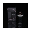 LELO Massage Candle Black Pepper Pomegranate Scent with sleek packaging on black background.