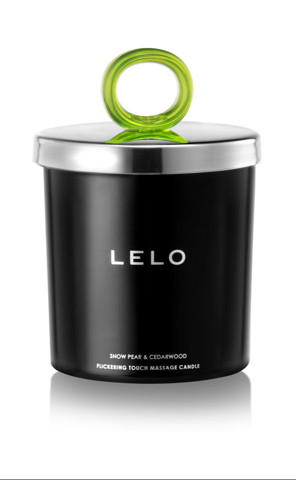 LELO Massage Candle Snow Pear and Cedarwood Scent in a sleek black container with a green lid.