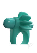 4T Skooch Vibrating Cock Ring with Clitoral Stimulator Kiwi in playful turquoise design for enhanced pleasure.