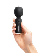 Bodywand Power Wand 4.5 Inch Silicone Wand Massager Black held in hand for easy use and portability.