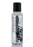 Sliquid Naturals Spark Booty Buzz Silicone Lubricant 2 Oz bottle with a sleek design and stimulating properties.