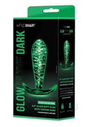 Whipsmart Glass Butt Plug with Curved Base 3.5 Inch Clear in packaging, glowing in the dark, promoting comfort and secure use.