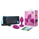 b-Vibe Vibrating Jewel Remote-Controlled Anal Plug Pink Ruby S M in packaging with accessories and USB charging cable.