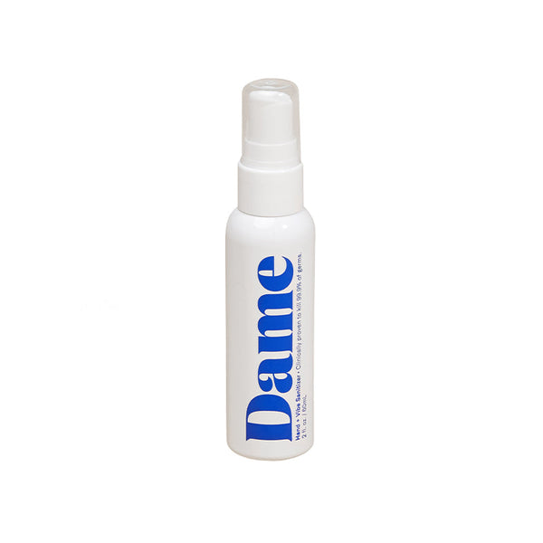 Dame Hand and Vibe Sanitizer 2 Oz in a sleek bottle, designed for effective hand and intimate toy cleaning.