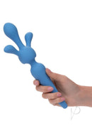 Couture Collection Rechargeable Silicone Body Wand Kit Blue, held in hand, showcasing its sleek design and flexible features.