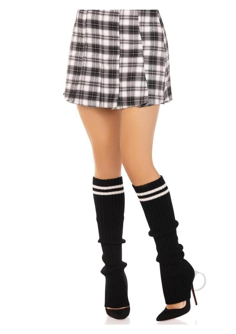 Leg Avenue Ribbed Stirrup Leg Warmers OS Black paired with a plaid skirt and high heels, showcasing trendy fashion.