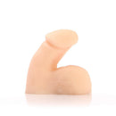 Tantus On The Go Realistic Silicone Packer Cream side view showcasing its lifelike design and soft silicone material.