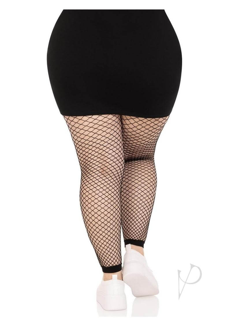 Plus size model wearing Leg Avenue Industrial Net Footless Tights, showcasing a breathable black fishnet design.