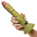 Creature Cocks Eyegor Thrusting & Vibrating Silicone Dildo Green held in hand with distinctive design and illuminated eye.