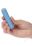 Hand holding the Turbo Buzz Rechargeable Rounded Bullet Blue compact stimulator for discreet pleasure.