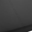 Kink Wet Works Fitted Waterproof Sheet King Black close-up on a sleek black surface, designed for liquid play.