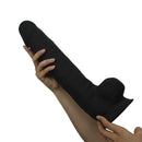 Silex-d The Original Model 1 15 Inch Dildo Black held in hand showcasing its dual-density design.