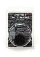 Prowler RED Silicone Ball Stretcher Large Black in packaging with a sleek design on a brick background.