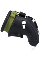 Fort Troff CUMfort Cage in black and green, flexible silicone chastity device with adjustable ring and padlock.