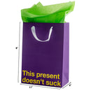 This Present Doesn't Suck Color Gift Bag Purple with green tissue, perfect for fun gifting occasions.