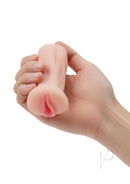 Zolo Stroke Off Mini Pussy Stroker Vanilla held in hand, showcasing its compact and realistic design.