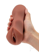 Zolo Stroke Off Thai Pussy Stroker Caramel held in hand showcasing its lifelike design and textures.