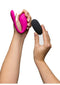 Person holding We-Vibe Jive 2 Pink G-Spot Vibrator and remote control.