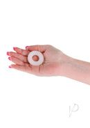 Firefly Bubble Ring Glow in The Dark Cock Ring Small White held in a hand, showcasing its size and design.
