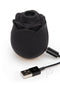 Fifty Shades of Grey Rose Clitoral Suction Stimulator, black, with 10 intense modes, rechargeable, and waterproof, shown with USB cable.
