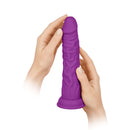 FemmeFunn Vortex Turbo Shaft 2.0 8 inch Vibrating Rotating Dildo Purple held in hands