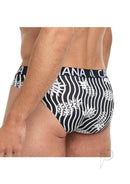 Man wearing Banana Cabana Bikini Black White Small Medium, showcasing black and white patterned swimwear from back view.