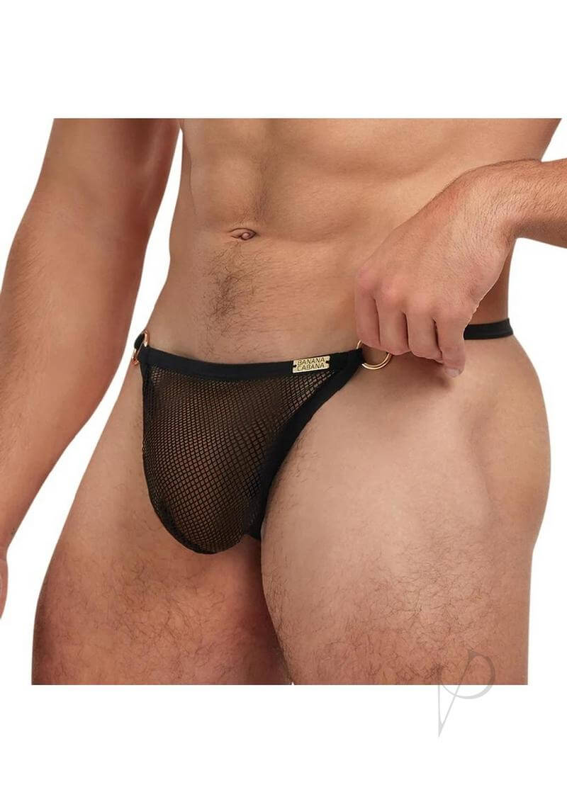 Banana Cabana Fishnet Thong Black Mesh Medium Large on a male model showcasing its daring design and comfortable fit.
