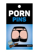 WoodRocket Butt Enamel Lapel Pin Black and Vanilla packaging with playful butt design.