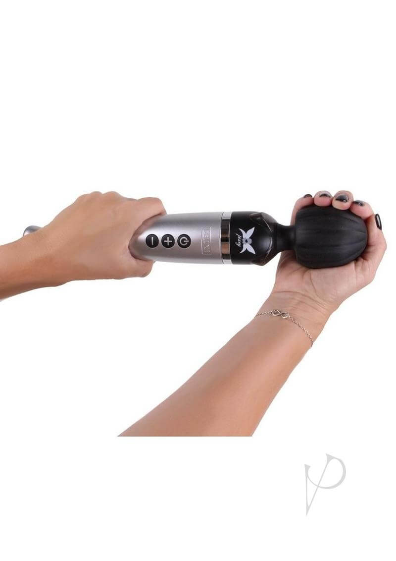 Person holding the Pixey Deluxe Rechargeable Wand Silver, showcasing its powerful and sleek design.