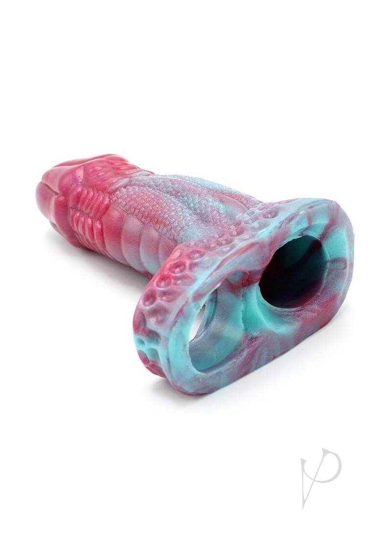 Monstar Beast Silicone Penis Sleeve 03 Pink Blue in vibrant pink and blue colors, designed for enhanced sensation and confidence.