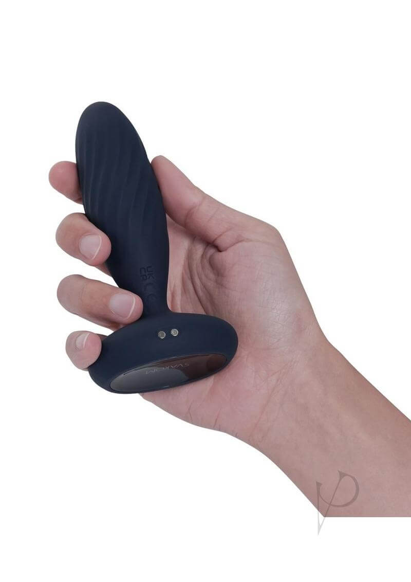 Hand holding the Jordan App-Controlled Thrusting Anal Vibrator by SVAKOM, showcasing its ergonomic design and control buttons.