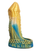 Alien Nation Komodo Silicone Penis Extender Green and Gold side view with scales and vivid colors.