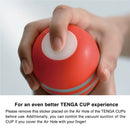 Hand holding Tenga Rolling Head Cup Gentle Disposable Masturbator with Air Hole for better experience.