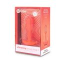 b-Vibe Vibrating Snug Plug 1 Weighted Silicone Anal Plug Orange packaged for retail display.