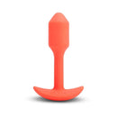 b-Vibe Vibrating Snug Plug 1 Weighted Silicone Anal Plug Orange displayed on a white background.