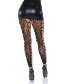 Leg Avenue Footless Leopard Lace Crotchless Tights Black styled with a short dress and heels, showcasing a bold look.