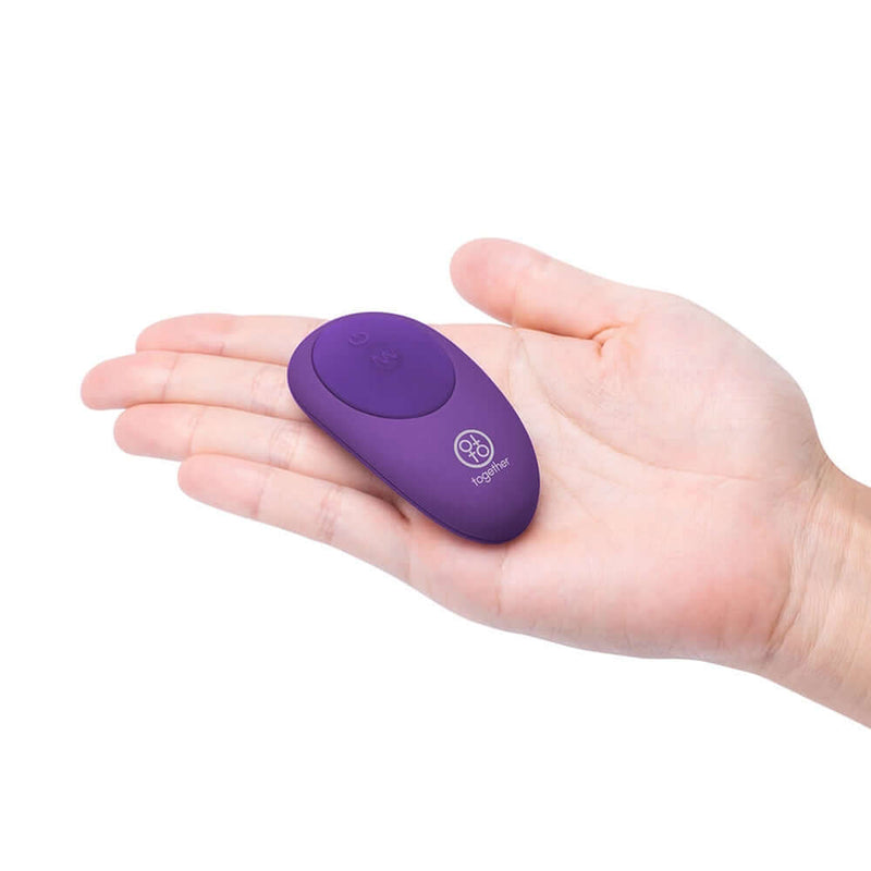 Together Couples Toy Remote Controlled Dual Ended Vibrator Purple held in a hand for scale.