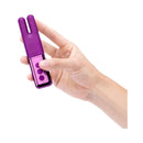 Le Wand Chrome Deux Rechargeable Mini Vibrator Dark Cherry held in hand, featuring dual motors and compact design.