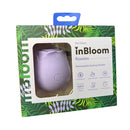 Inbloom Rosales Sucking Vibrator Lavender in packaging, showcasing its rose-shaped design and features.