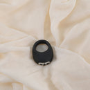 Je Joue Mio Rechargeable Vibrating Silicone Cock Ring Black on soft fabric background